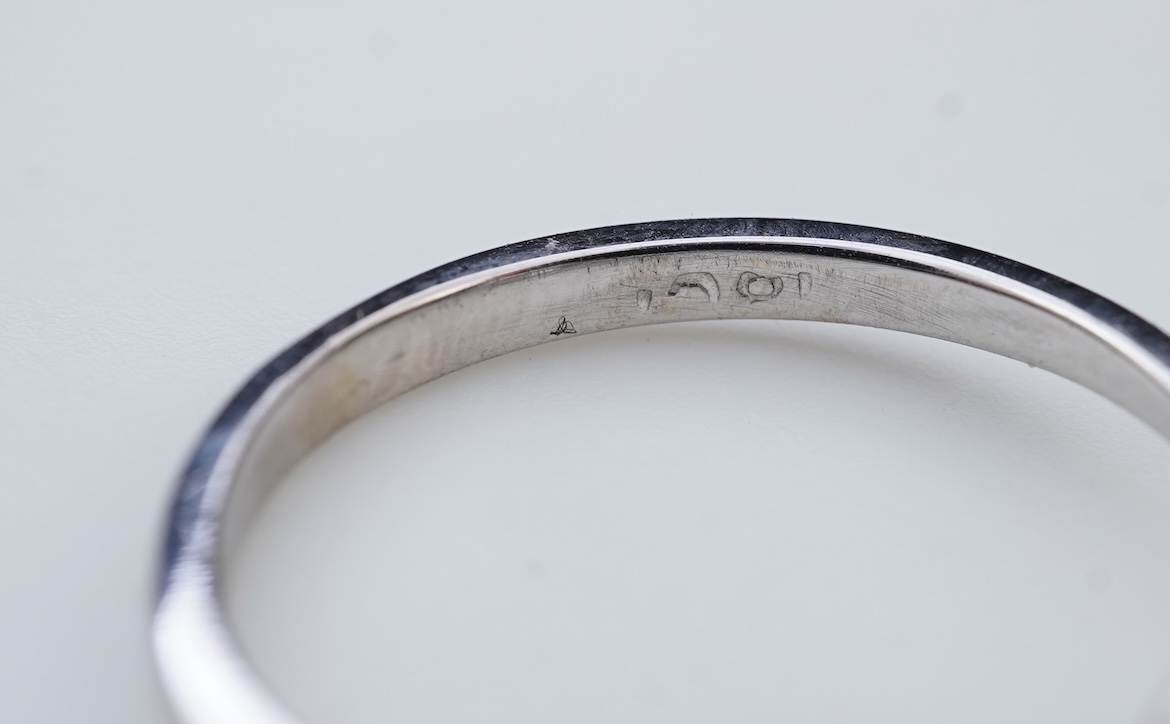 A diamond solitaire ring